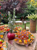 A autumnal table laid with with tea jelly and pumpkin pie