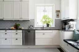 Bright kitchen with integrated bench seat