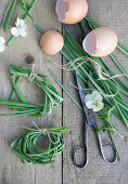 Eggshells and wreaths made from grape hyacinth leaves, Easter decorations
