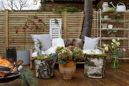 Autumnal patio design with natural materials and plants