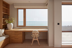 Room with wooden furniture and sea view
