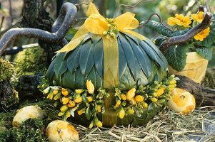 Egg decorated with bay leaves & freesias for Easter