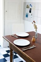 A minimally laid table in a student kitchen
