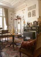 Antique furnished living room with oriental carpet