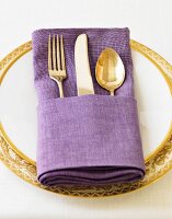 A Place Setting with a Purple Napkin