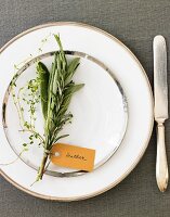 Place Setting with a Bouquet of Herbs and a Name Tag