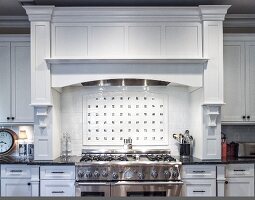 Kitchen with White Cabinets and a Stainless Steel Oven