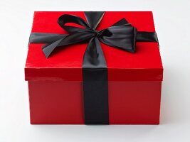 Red Gift Box with a Black Ribbon; Box of Chocolates
