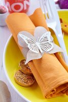 Brown paper napkin rings with butterfly motif