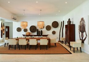 Dining room furnished in contemporary African style in Tanzanian hotel