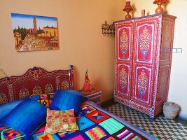 A room furnished with colourful accessories in Riad le Mazagao in El Jadida, Morocco