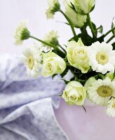 Bouquet of white roses and gerbera daisies