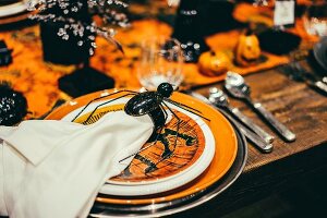 Halloween place setting on decorated table