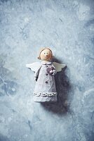 Christmas angel on marble surface