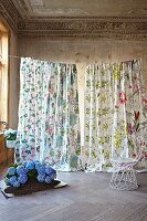 Lengths of fabric with romantic floral patterns