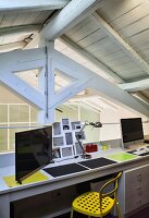 Double desk on gallery in roof space