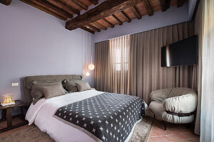 Elegant bedroom in shades of grey