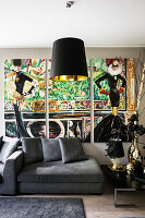 Triptych above grey sofa in glamorous living room