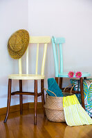 Wooden chairs painted in pastel colours