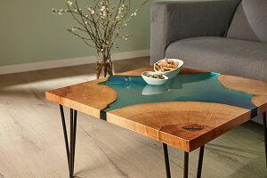 Handcrafted coffee table made from wood and epoxy resin with hairpin legs
