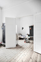 View into child's bedroom through open double doors