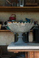 Antique planter on table in summerhouse