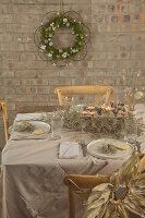 Easter table rustically set with natural materials in shades of grey