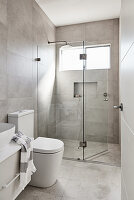 Tiled bathroom with walk-in shower