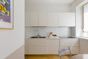 View of white fitted kitchen