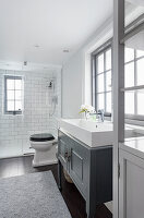 Bright bathroom with shower area