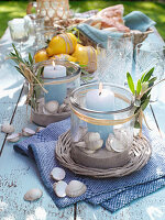 DIY lanterns with seashells as table decorations