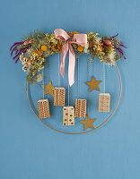 Christmas wreath with dried flowers and matchboxes