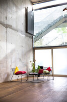 Sitting area in a loft at concrete wall