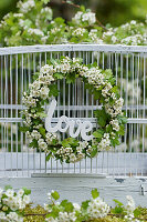 Hawthorn wreath with lettering reading 'Love'