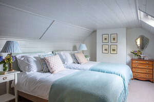 Two single beds in bright attic room