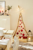 DIY Christmas tree made from branches, Christmas baubles, fairy lights and a star