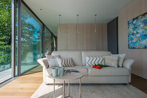 Lounge with floor-to-ceiling sliding glass doors