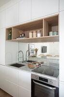 Modern, white fitted kitchen cabinets