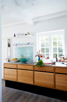 Made-to-measure kitchen cabinets with wooden fronts