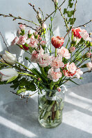 Spring bouquet with carnations (Dianthus) and tulips (Tulipa)