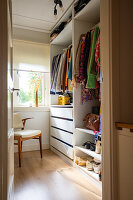 Walk-in wardrobe with drawers and compartments