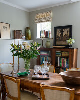 French wooden table and 1930s vintage-style dining chairs