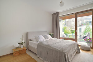 Bright bedroom with balcony access