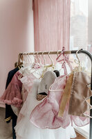 Clothes and costumes on a clothes rail in a children's room