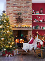Living room decorated for Christmas with fireplace and Christmas tree