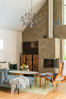 Modern living room with fireplace, firewood and seating area