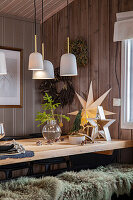 Dining area with wooden panelling and Christmas decorations