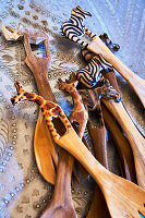 Wooden salad servers with carved animal motifs