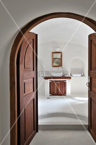 Open Double Doors Of Dark Wood In Arched Buy Image