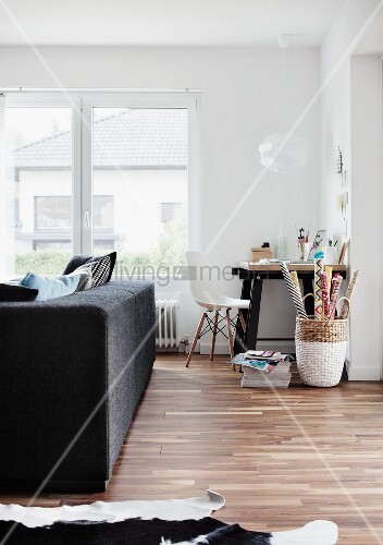 Partially Visible Cowhide Rug On Wooden Buy Image 11248480